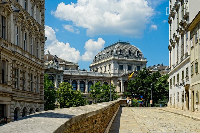Vienna: Freud, Mozart & Beethoven Exploration Game - Phone setup, sunlight, and crowded streets