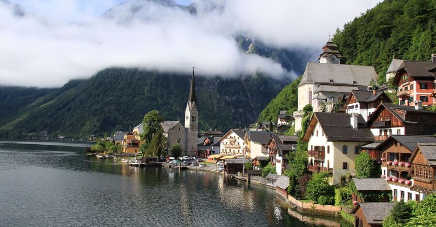 Vienna: Hallstatt & Alpine Peaks Day Trip with Admont Abbey - The coach ride from Vienna to the Alps