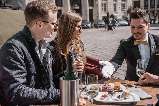 Vienna Horse-Drawn Carriage Ride with Sparkling Wine and Food - A royal start inside the Hofburg