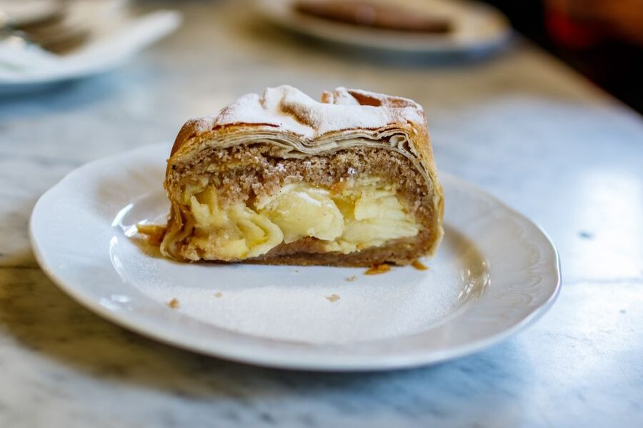 Vienna: Typical Austrian Food Tour with Coffee House Visit - Candy making and a sweet stop with a little theater