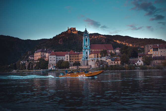 Wine tasting on traditional wooden boats in Wachau Valley - Key details at a glance